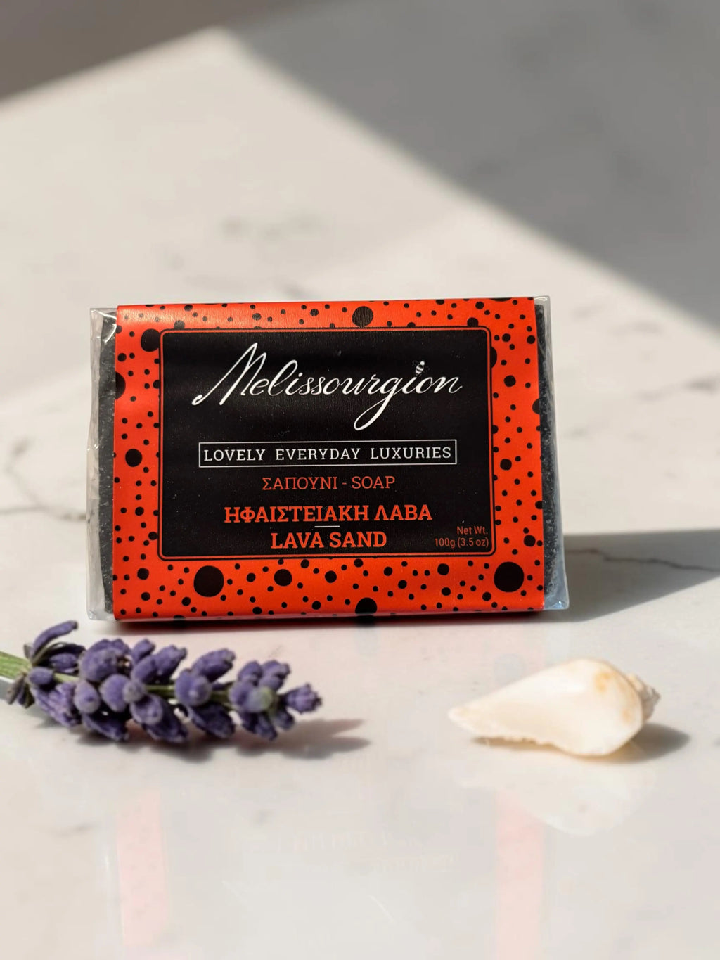 Melissourgion Seife in orangefarbener Box mit Sprenkelmuster