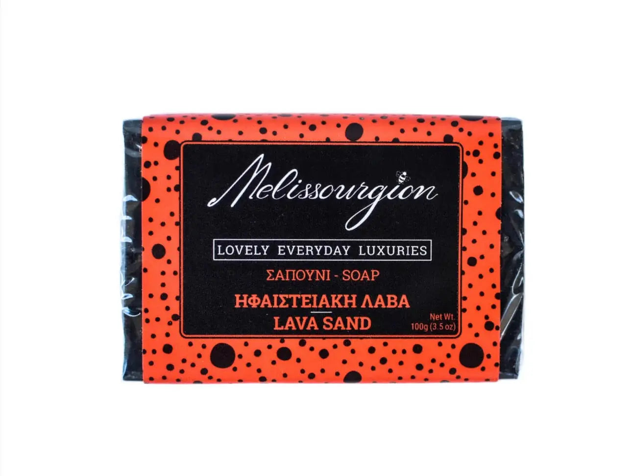 Melissourgion Handseife Lava Sand, schwarze Verpackung mit orangefarbenen Punkten